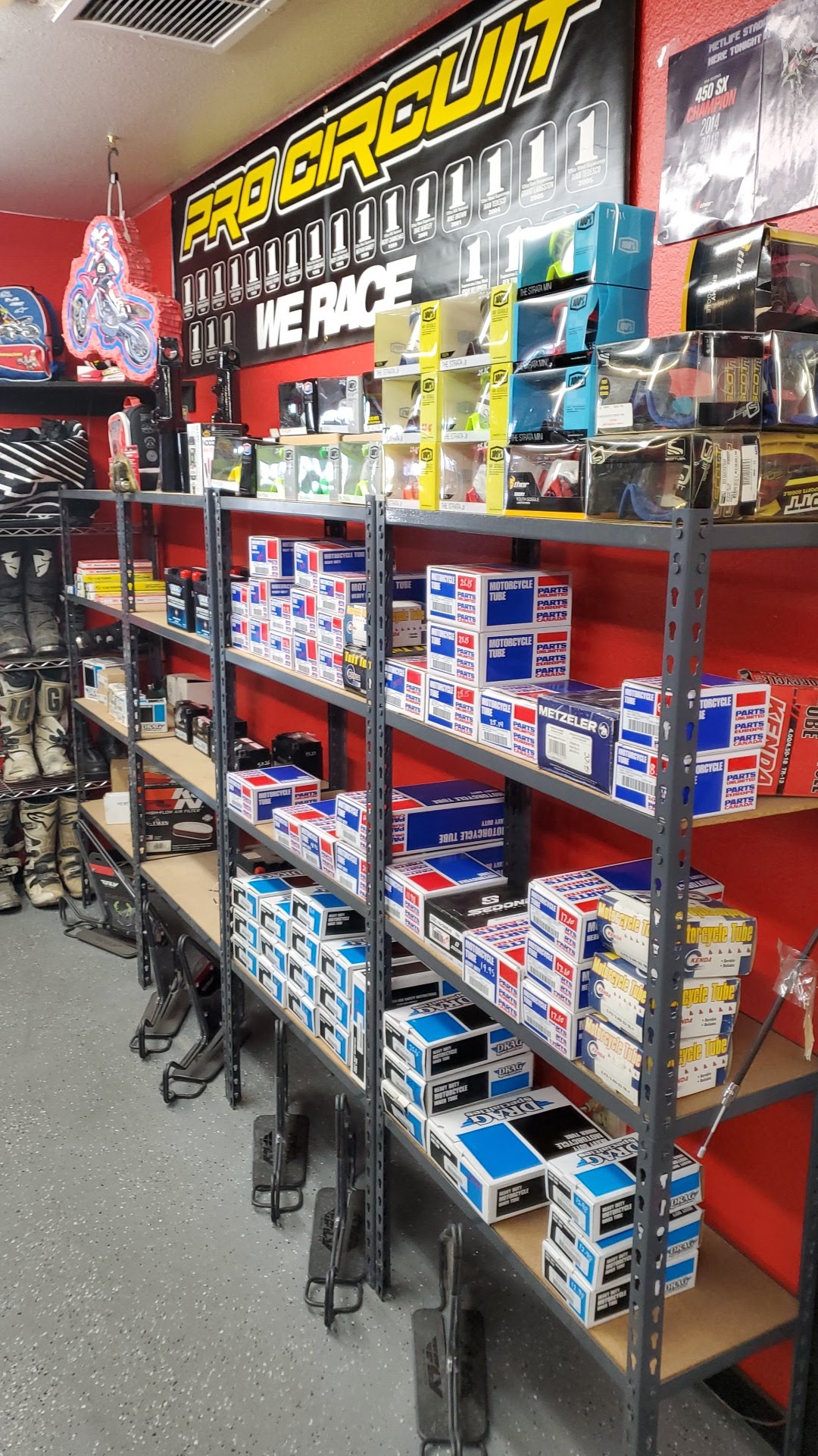 Shelves of motorcycle parts inside Canyon Country Cycle