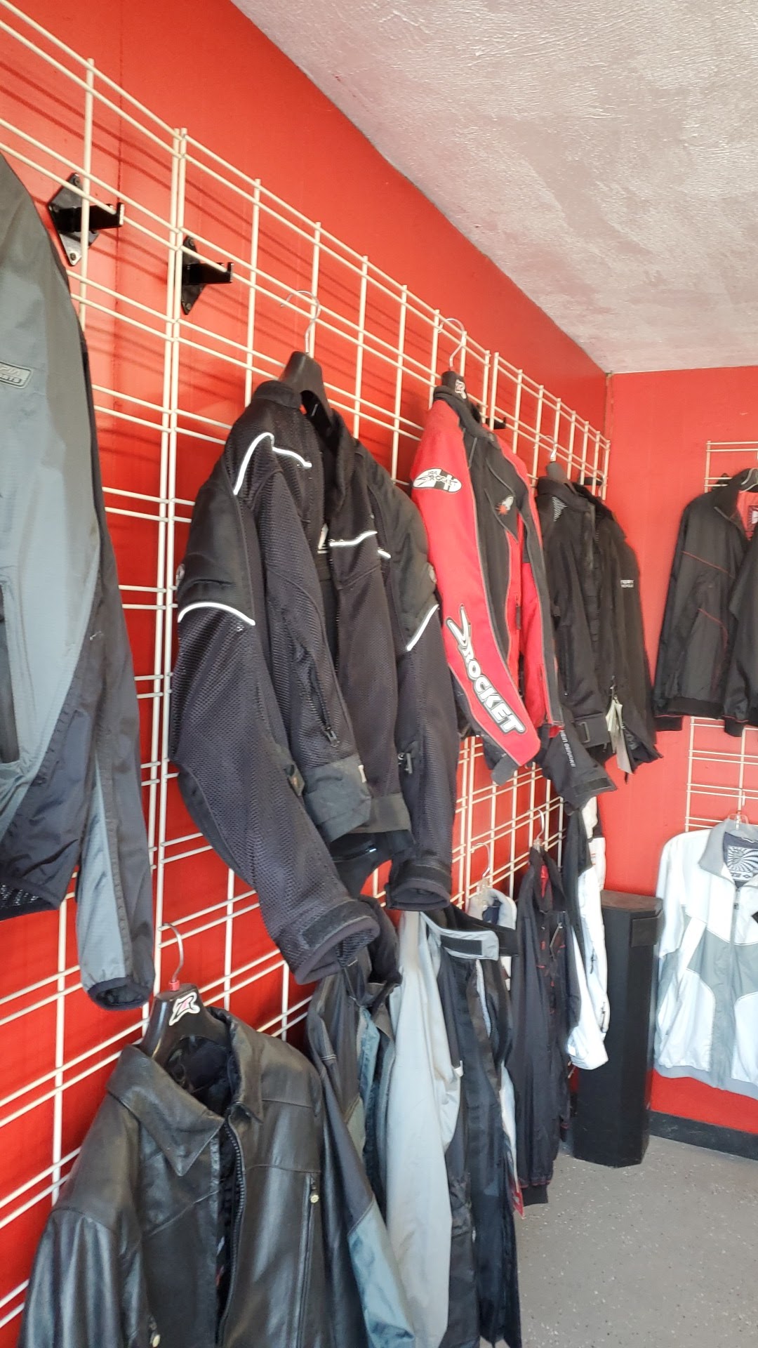Riding jackets on the wall at Canyon Country Cycle